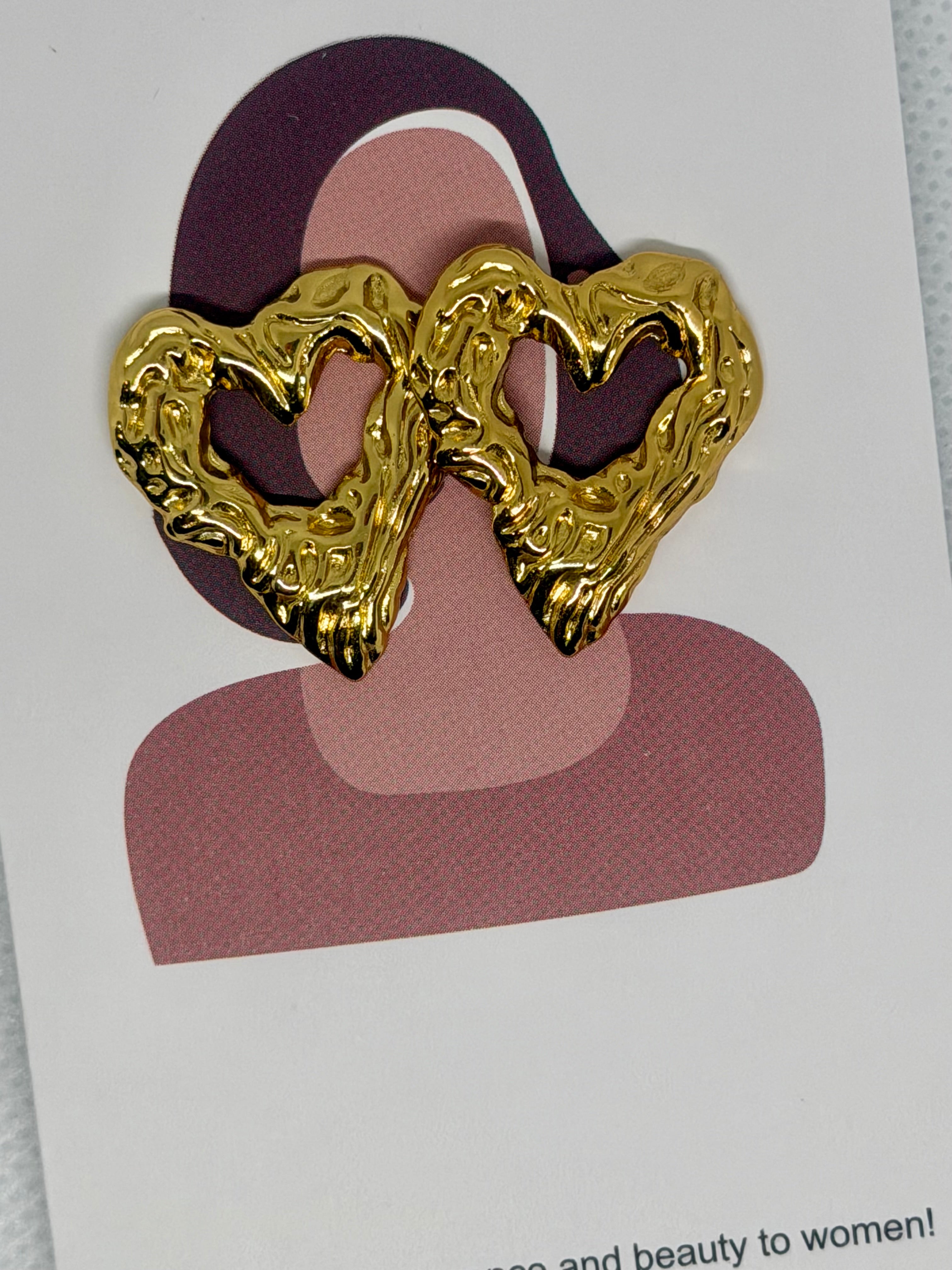 Orecchini cuore martellato