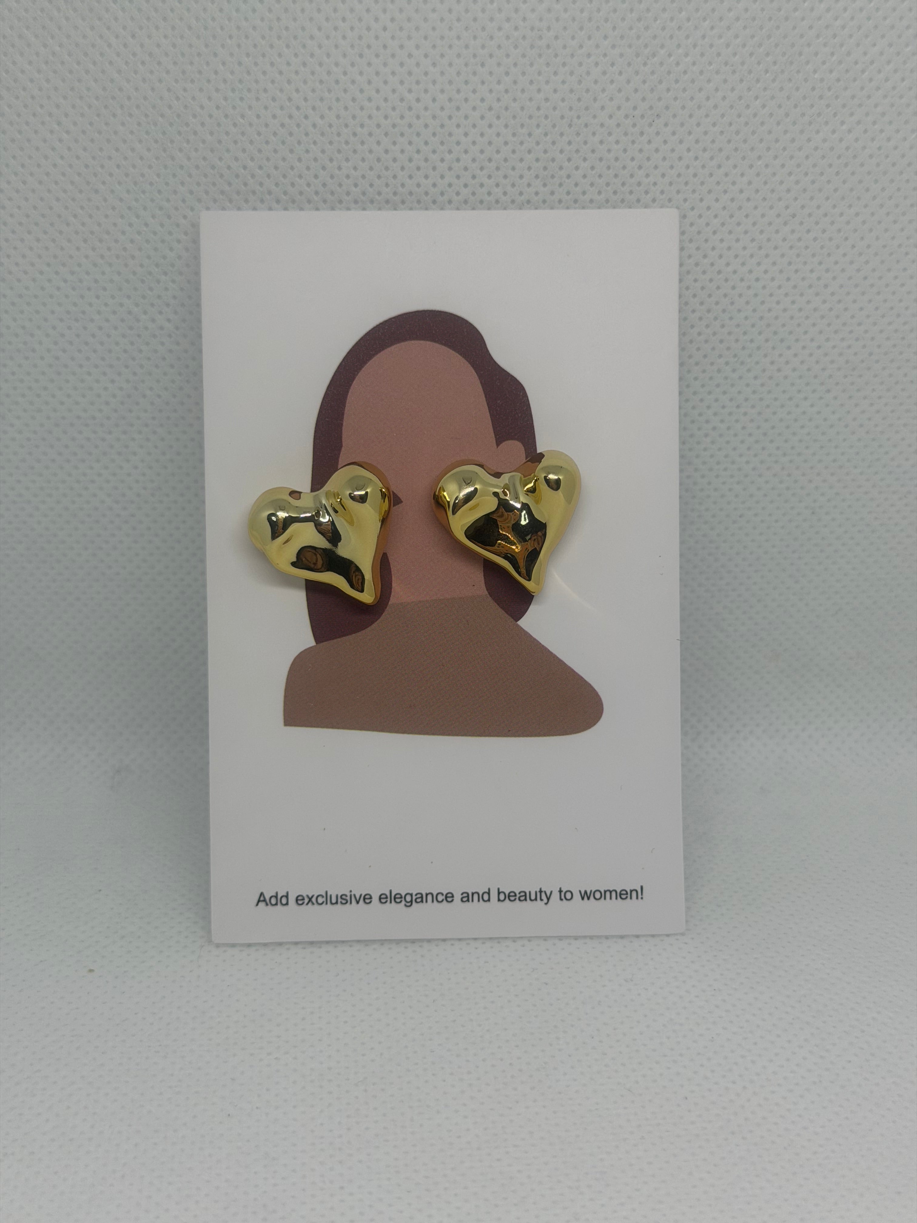 Orecchini cuore martellato